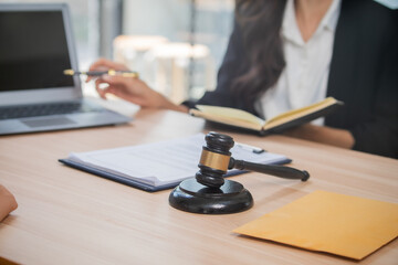 A professional attorney who reviews legal documents, provides fair advice, and strategic guidance in formal court matters, contracts, judgments, partnerships, rights, and powers. © NANKHAMMAI