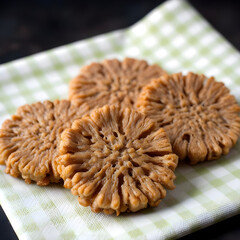 Crispy Buckwheat Cakes on Checkered Napkin &ndash; High-Resolution Food Photography