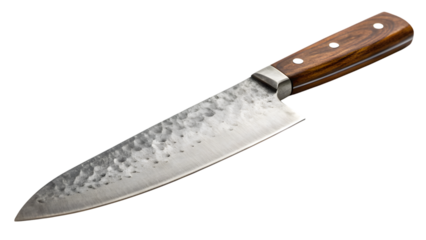 a hand-forged chef’s knife with wooden handle isolated on white