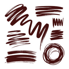 Collection of dark red brush strokes and scribbles on white background hand drawn paint