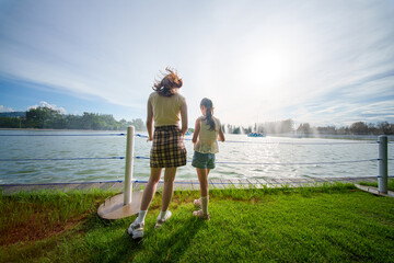 Factory employee monitors water bottle production line in a clean environment