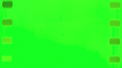 Green screen film negative with faint glow on green screen chromakey background in 2d animated cartoon animation format. Suited for subtle green, faint key, or low light negative in compositing