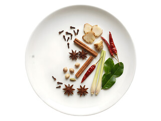 A Culinary Symphony of Spices and Herbs Artfully Arranged on a White Plate