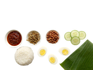Delicious Traditional Malaysian Nasi Lemak Platter with Rice, Eggs, and Sambal Accompaniments