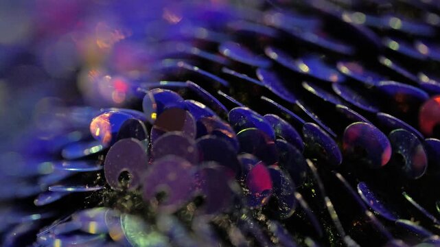 shining blue sequins sparkling under light