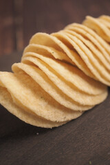 Crispy potato chips arranged neatly on a platter