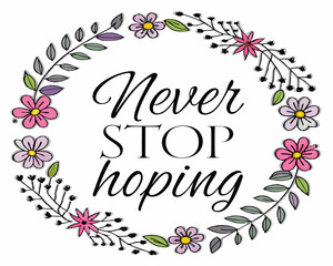 Never stop hoping inspirational quote surrounded by floral wreath