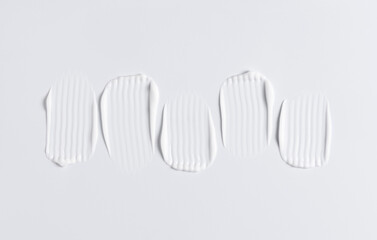 Fototapeta premium A sample of a white moisturizing cosmetic cream for the body or face with salicylic acid