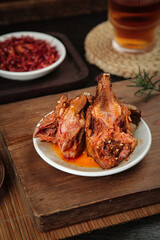 Spicy Rabbit Head Dish Chengdu Sichuan Cuisine Traditional Chinese Food with Chili Oil and Tea