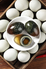 Traditional Chinese Century Duck Eggs with Fresh Eggs in Bamboo Steamer - Asian Gourmet Delicacy Food Ingredients