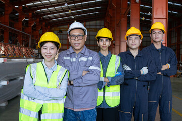 Group of engineers boost customer confidence. Teamwork concept. Group of young businessmen working as a team and shaking hands.