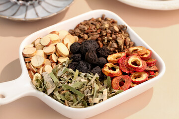 Traditional Chinese Herbal Soup Ingredients with Dried Plums and Cooling Herbs for Summer Heat Relief