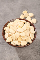 Peeled Sliced Almonds in Wooden Bowl - Healthy Nuts Ingredient Photo