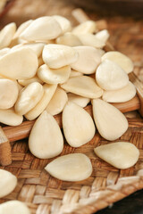 Clean Peeled Sliced Sweet Almonds on Wicker Basket - Southern Style Nut Photography