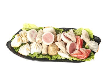 Hot Pot Ingredients Variety Platter with Beef Balls Fish Balls Dumplings and Vegetables in Black Serving Dish