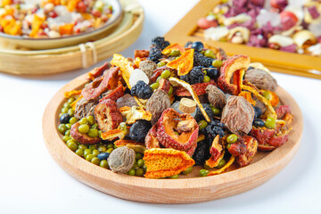 Mixed Dried Fruits Nuts and Legumes in Wooden Bowls Healthy Snack Ingredients