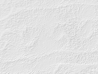 A white wall with a rough texture