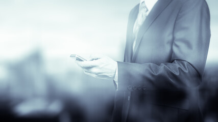 business man using mobile smartphone, close up of a copy space