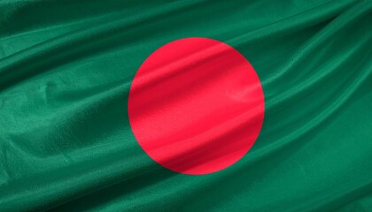 Bangladeshi flag with red circle offset left on green field, shown with fabric texture and gentle motion.