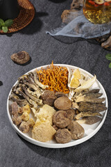 Precious Colorful Dried Mushrooms and Mountain Ingredients for Traditional Soup Making with Red Wolfberries and Dates