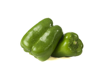 Fresh Green Bell Peppers with Water Droplets on White Background