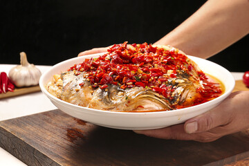 Spicy Fish Head with Chopped Red Pepper Sauce - Traditional Asian Cuisine Dish on White Plate