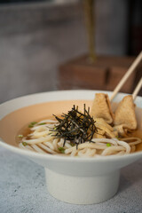 Japanese Udon Noodle Soup with Oden and Seaweed