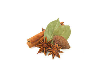 Aromatic Cooking Spices with Cinnamon Star Anise Bay Leaves and Nutmeg Studio Shot on White Background