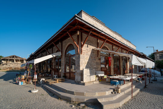 Beysehir, Konya, Turkey - August 18, 2025: Historic Beysehir Bedesten showcasing traditional shops and stone arches