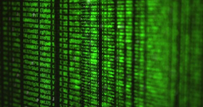 hacking concept green text source code in monitor black tech security