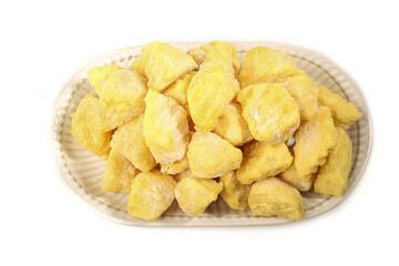 Crispy Golden Potato Chunks in Wicker Basket - Popular Snack Food on White Background