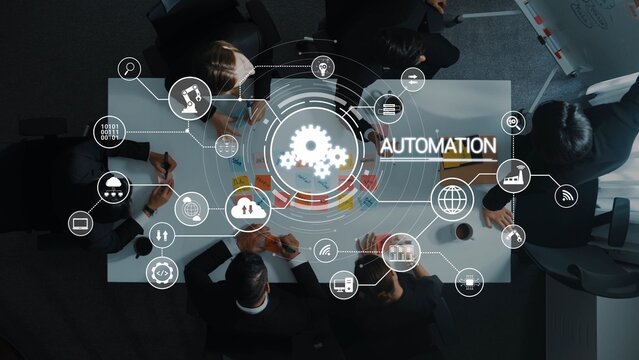A diverse team collaborates on automation strategies surrounded by digital icons and gears, reflecting innovation and productivity in a modern business environment. Raster