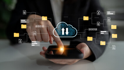 A business professional interacts with a smartphone showcasing cloud technology symbols. This image represents digital transformation and seamless data transfer in modern communication. Gantry