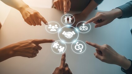 Hands pointing at digital icons representing teamwork and collaboration on a table