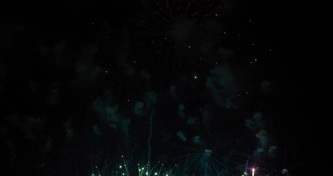 Celebration greeting Beautiful fireworks colorful fireworks on the beach for abstract background , anniversary, celebration , 4th of July independence day and new year background or wallpaper.