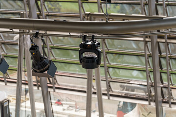 Stage lights hang ready in preparation for an event at a convention center in downtown Pittsburg, Pennsylvania