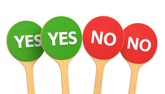 Four circular signs with YES and NO texts, green and red. They stand on wooden sticks