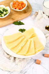 German Block Cheese with Holes - Fresh Ingredients Ready to Eat