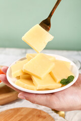 Fresh German Cheese Cubes on White Plate with Fork