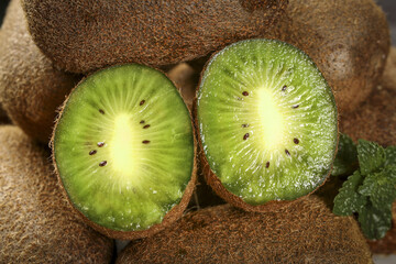 Fresh Cut Kiwifruit Halves with Green Flesh and Seeds