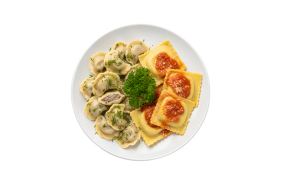Dumplings and parsley - Russian pelmeni - Italian ravioli - on a white plate, isolated.