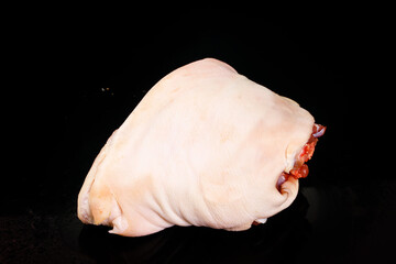 Raw Pork Trotters on Black Background - Fresh Butcher Cut