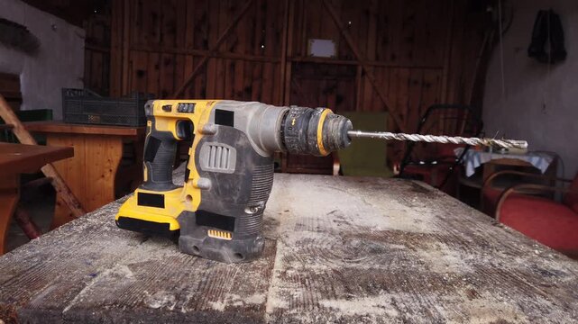 Still video of cordless SDS rotary hammer drill on wooden table