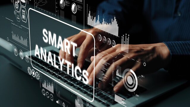 Hands Typing on Laptop with Smart Analytics Graphic Overlay and Data Visualization Elements in Modern Workspace. Asymptotic smart data analytic.