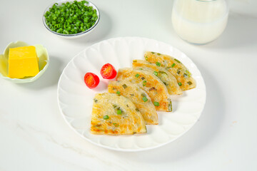 Handmade Scallion Pancakes with Authentic Panfried Flavor and Fresh Garnishes