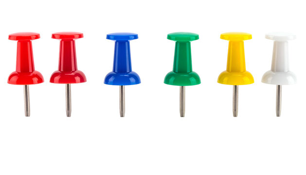 Six colorful thumb tacks arranged horizontally against a black background