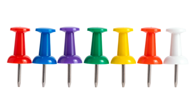 A row of seven push pins in various colors, arranged horizontally on a black background - Powered by Adobe