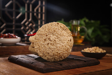 Traditional Henan Dried Tofu Soy Products - Crispy Vegetarian Protein on Wooden Board
