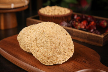 Dried Tofu Skin on Wooden Board with Soybeans and Dates - Chinese Vegetarian Protein Food Ingredients