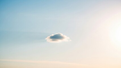 Solitary cloud against a beautiful gradient sky background